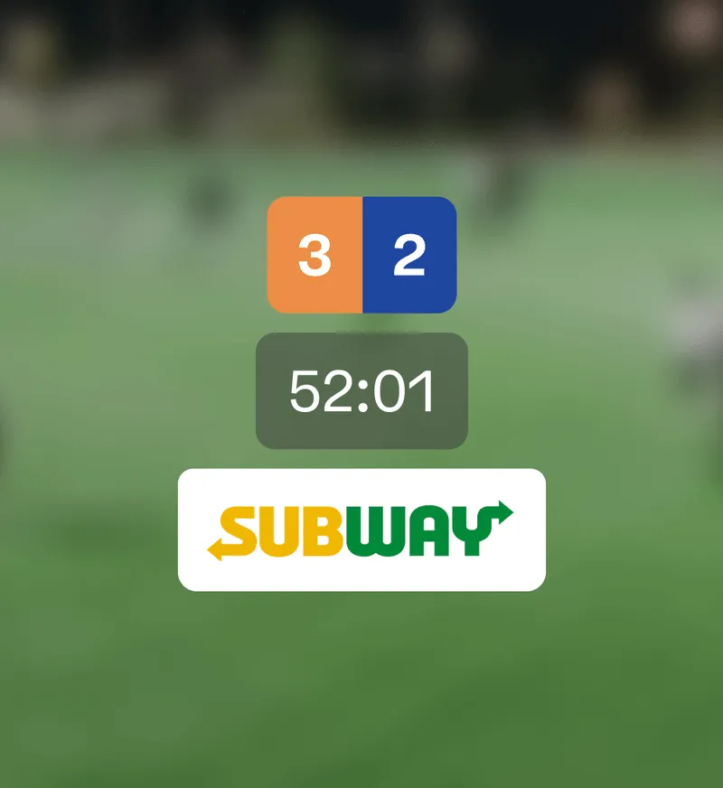 Digital scoreboard showing a score of 3 to 2 and a time of 52:01 with a Subway logo below.