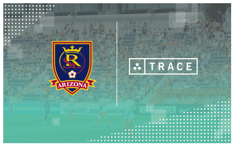 RSL Arizona And Trace Real Salt Lake Arizona crest beside the Trace logo over a faded stadium crowd background.