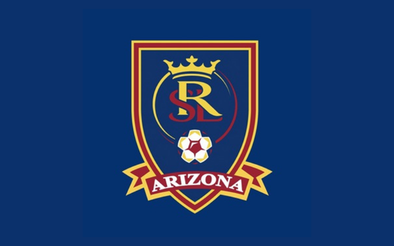 Real Salt Lake Arizona club crest with a crown and soccer ball on a navy background.